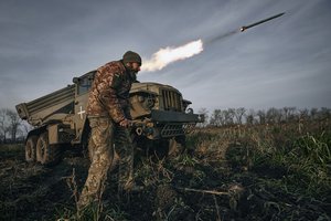 Ukrainian military's Grad multiple rocket launcher fires rockets at Russian positions in the frontline near Bakhmut, Donetsk region, Ukraine, Thursday, Nov. 24, 2022.