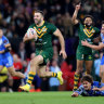 James Tedesco runs away for one of his two tries.