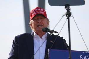 President Donald J. Trump dances at the conclusion of a rally in Greenwood, Neb.