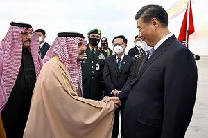 Chinese President Xi Jinping, right, shakes hands with Prince Faisal bin Bandar bin Abdulaziz, Governor of Riyadh, after his arrival in Riyadh, Saudi Arabia, Wednesday, Dec. 7, 2022