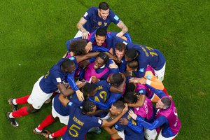 France's Randal Kolo Muani is congratulated by teammates after scoring his team's second goal during the World Cup semifinal soccer match between France and Morocco at the Al Bayt Stadium in Al Khor, Qatar, Wednesday, Dec. 14, 2022.