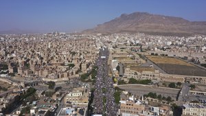 FILE - Houthi supporters attend a rally marking the seventh anniversary of the Saudi-led coalition's intervention in Yemen's war, in Sanaa, Yemen, March 26, 2022.