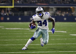 Dallas Cowboys running back Ronnie Hillman (34) sprints to the end zone for a touchdown against the Oakland Raiders in the second half of a preseason NFL football game, Saturday, Aug. 26, 2017, in Arlington, Texas.