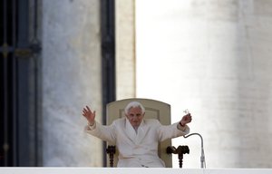 FILE - Pope Benedict XVI waves to the faithful during his final general audience in St.Peter's Square at the Vatican on Feb. 27, 2013.