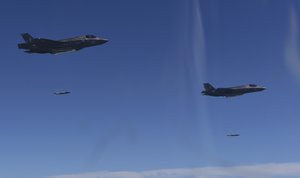 In this photo provided by South Korea Defense Ministry, U.S. Air Force F-35 stealth fighter jets drop bombs over the Korean Peninsula, South Korea, Thursday, Aug. 31, 2017. The United States flew some of its most advanced warplanes in bombing drills with ally South Korea on Thursday, a clear warning after North Korea launched a midrange ballistic missile designed to carry nuclear bombs over Japan earlier this week, South Korea's military said. North Korea hates such displays of U.S. military might at close range and will likely respond with fury.