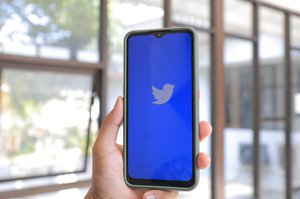 Twitter logo on a smartphone screen