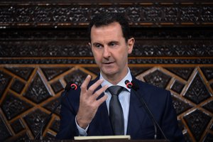 In this photo released by the Syrian official news agency SANA, Syrian President Bashar Assad, addresses a speech to the newly-elected parliament at the parliament building, in Damascus, Syria, Tuesday, June 7, 2016.