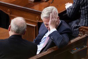 Rep. Kevin McCarthy, R-Calif., sits after the 13th round of voting for speaker in the House chamber as the House meets for the fourth day to elect a speaker and convene the 118th Congress in Washington, Friday, Jan. 6, 2023.