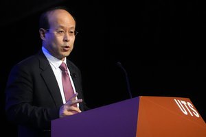 Ambassador to Australia, Xiao Qian gestures during his address on the state of relations between Australia and China