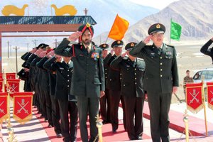 Indian and Chinese Army Jawans at Ceremonial Border Personnel Meeting( BPMs) on the occassion of " Harvest Festival" at Indian BPM hut in Chushul in eastern Ladakh, India, 12 April 2017.