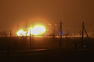 A flame rises after an explosion at a gas pipeline near Pasvalys, 175 km (109 miles) north of Vilnius in northern Lithuania on Friday, Jan. 13, 2023.