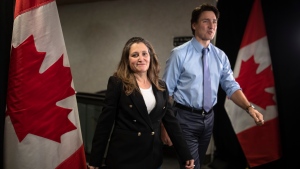 Deputy Prime Minister and Finance Minister Chrystia Freeland, along with Prime Minister Justin Trudeau, arrive at the Hamilton Convention Centre, in Hamilton, Ont., ahead of the Liberal Cabinet retreat, on Monday, January 23, 2023. THE CANADIAN PRESS/Nick Iwanyshyn