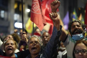 Demonstrators shout slogans against Brazilian former President Jair Bolsonaro during a protest calling for protection of the nation's democracy in Sao Paulo, Brazil, Monday, Jan. 9, 2023, a day after Bolsonaro supporters stormed government buildings in the capital.