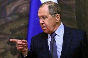 Russian Foreign Minister Sergey Lavrov gestures while speaking during a joint news conference with International Committee of the Red Cross (ICRC) President Peter Maurer following their talks in Moscow, Russia, Thursday, March 24, 2022.