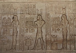 Hieroglyphs carvings on the wall at the Dendera Temple, Egypt