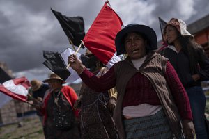 Anti-government protesters chant slogans in Juliaca, Peru, Monday, Jan. 30, 2023. Protesters are seeking immediate elections, President Dina Boluarte's resignation, closure of the Congress and the release of President Pedro Castillo who was ousted and arrested for trying to dissolve Congress in December. (AP Photo/Rodrigo Abd)