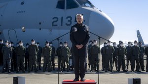 Visit of Jens Stoltenberg, Secretary General of NATO to Japan. The Secretary Genral tours Iruma Air Base / the fighter cockpit is an F-2, the cargo plane is a C-2, he also saw other capabilities including a Patriot system and F-15 fighters