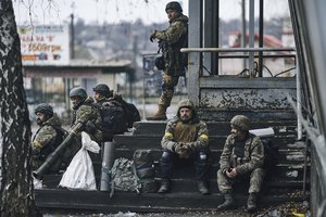 FILE - Ukrainian soldiers rest near their position in Bakhmut, Donetsk region, Ukraine, Saturday, Dec. 17, 2022.