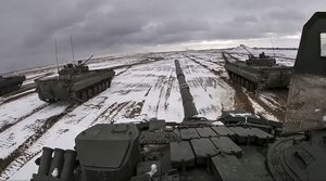 File - In this image from video released by the Russian Defense Ministry Press Service on Wednesday, Feb. 2, 2022, Russian and Belarusian armored vehicles drive during a joint military drills at Brestsky firing range, Belarus. Fears are rising about what would happen to Europe's energy supply if Russia were to invade Ukraine.