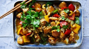 Chicken stir-fry with colourful capsicums and cashew nuts.