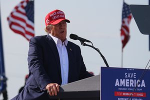 President Donald J. Trump dances at the conclusion of a rally in Greenwood, Neb.