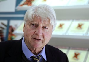 Stanley Johnson poses for a portrait as he talks to the Associated Press at the London Book Fair