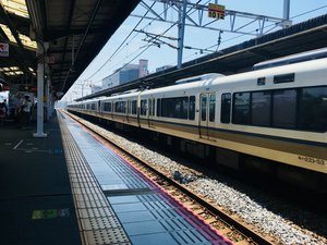 A train on a terminal stop platform in Japan.