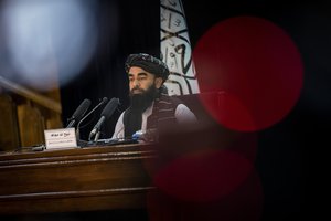 Taliban government spokesman Zabihullah Mujahid gives a press conference in Kabul, Afghanistan, Tuesday, Sept. 21, 2021.