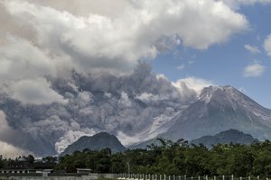 Mount Merapi releases volcanic materials during an eruption in Sleman, Indonesia, Saturday, March 11, 2023