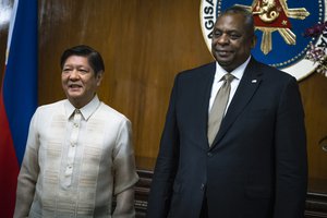 Secretary of Defense Lloyd J. Austin III greets Philippine President Ferdinand "Bongbong" Marcos in Manila, Feb. 2, 2023