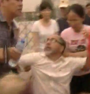 August 2008, Beijing: Plainclothes Chinese police drag away the leader of the American-based Christian Defence Coalition, Reverend Patrick Mahoney, as he leads a rally of American bigots opposed to abortion rights in China. After arresting the hardline right-wing activists, the Peoples Republic of China (PRC) police let them go. Good job, PRC workers state police – but maybe next time let these scum rot in jail for a while! The Christian Defence Coalition is an ultra-right wing Christian fundamentalist group specialising in extreme anti-abortion activities, homophobia and opposition to contraception. Mahoney had previously been a co-founder of the militant, anti-abortion group, Operation Rescue, whose members were involved in several terrorist attacks on women seeking abortion in the U.S. and doctors providing the service.