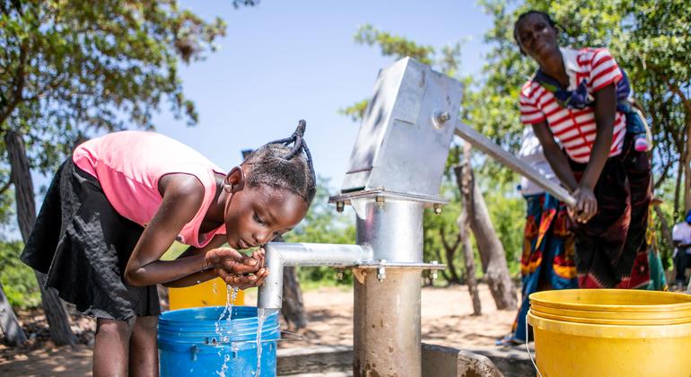 A young girl collects water from a recently rehabiliatitaed well in Gwembe Valley, Zambia