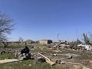 Debris covers the ground on Saturday, March 25, 2023 in Silver City, Miss. Emergency officials in Mississippi say several people have been killed by tornadoes that tore through the state on Friday night, destroying buildings and knocking out power as severe weather produced hail the size of golf balls moved through several southern states.