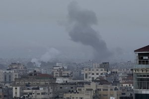 Smoke rises after Israeli airstrikes on Hamas military camp in Gaza City, Wednesday, April 5, 2023