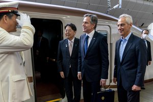 U.S. Secretary of State Antony Blinken, center right, accompanied by U.S. Ambassador to Japan Rahm Emanuel, right, and Japan's Foreign Minister Yoshimasa Hayashi, second from left, is greeted as he boards a train at Tokyo Station in Tokyo, Sunday, April 16, 2023, to travel to Karuizawa, Japan for a G7 Foreign Ministers' Meeting.