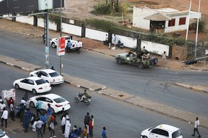 Members of the Rapid Support Forces, a paramilitary force operated by the Sudanese government, block roads in Khartoum, Sudan