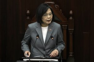 Taiwan's President Tsai Ing-wen addresses the National Assembly in Belmopan, Belize, Monday, April 3, 2023