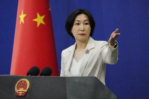 Chinese Foreign Ministry spokesperson Mao Ning gestures during a daily briefing at the Ministry of Foreign Affairs office in Beijing, Monday, April 24, 2023