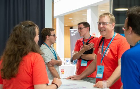 Registration desk at WordCamp Zurich 2019 by Cv7 (CC BY-SA 4.0)