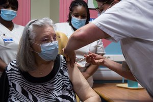 A person getting vaccinated against COVID-19, France