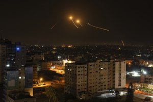 Rockets are launched from the Gaza Strip towards Israel, in Gaza City, Thursday, May 11, 2023.