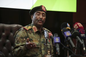 Sudan's head of the military, Gen. Abdel-Fattah Burhan,peaks during a press conference at the General Command of the Armed Forces in Khartoum, Sudan, Tuesday, Oct. 26, 2021.