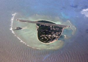 Old and upside-down aerial view of Woody & Rocky Islands prior to the building of the third harbor. China - Vietnam border