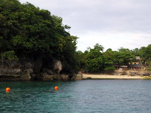 Orange balls float on the sea as markers for guests to stay behind the line at Boracay Island, Philippines as seen in this March 11, 2009 photo.