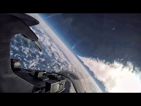 F-16 Flies Through Contrail