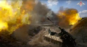 In this photo released by Russian Defense Ministry Press Service on Thursday, May 18, 2023, a Russian 152 mm self-propelled gun Giatsint-S fires toward Ukrainian position at an undisclosed location.