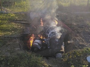 In this photo provided by the Ukrainian Police Press Office, fragments of a Russian rocket which was shot down by Ukraine's air defence system are seen after the night rocket attack in the Kyiv region, Ukraine, Thursday, May 18, 2023