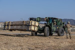 Soldiers assigned to the 35th Air Defense Artillery Brigade move Patriot missile ammunition during recent training in the Republic of Korea