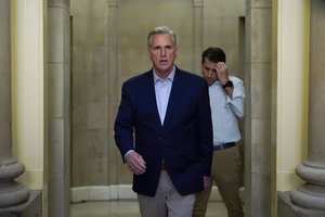 Speaker of the Kevin McCarthy, R- Calif., walks out of his office to speak with members of the press after participating in a phone call on the debt ceiling with President Joe Biden, Sunday, May 21, 2023