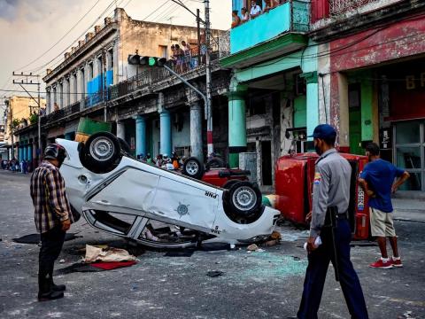 An overturned police car during the Cuban riots of July 11 2021.